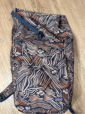 Patagonia Navy Backpack with Cream & Orange Wave Print
